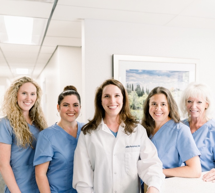 Doctor Julia Karpman and dental team members smiling in Rocky Hill dental office