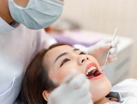 A woman getting a dental checkup